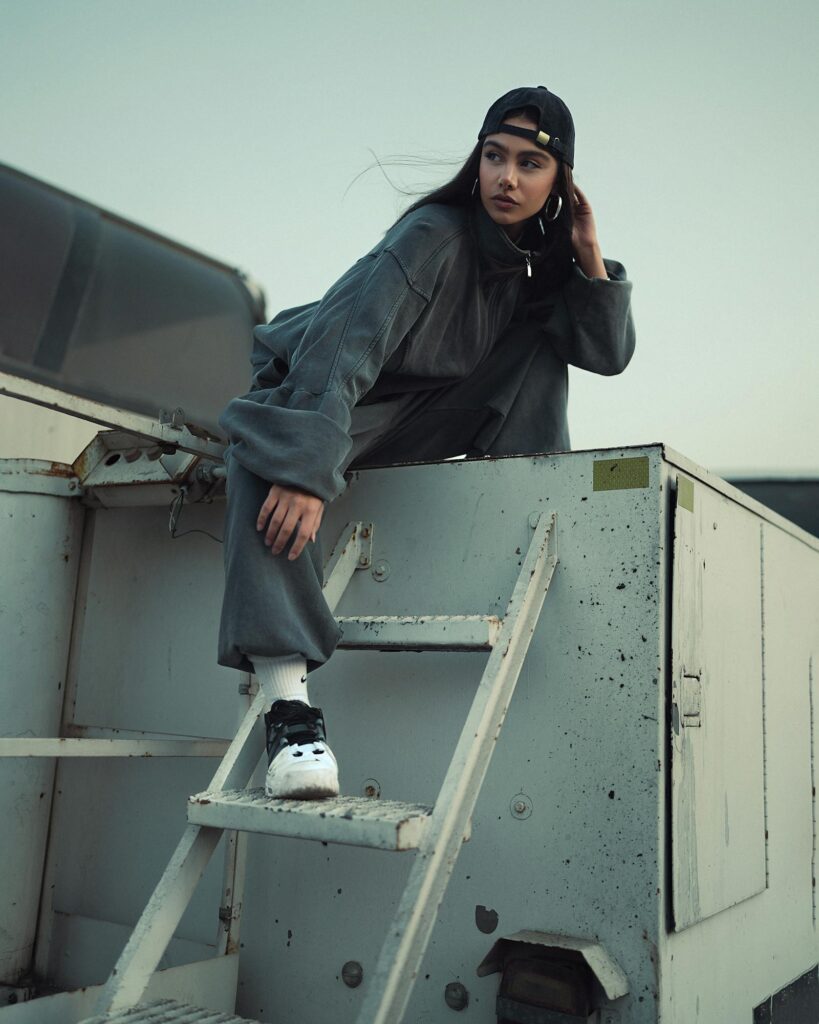 Urban fashion portrait on an industrial rooftop